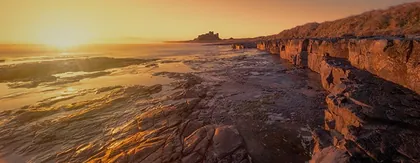 Bamburgh Castle Sunrise, a photograph from the North East