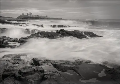 Dunstanburgh Castle Turner's View, a black and white photograph from the North East