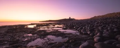 Dunstanburgh Colourful Morning, a photograph from the North East