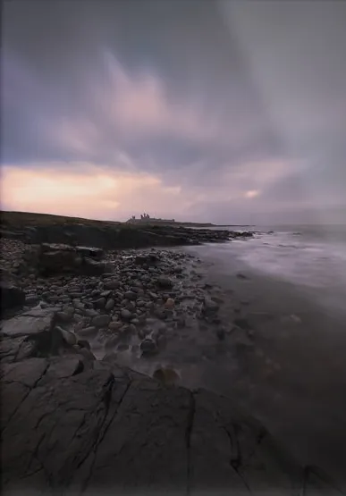 Dunstanburgh Glow, a photograph from the North East