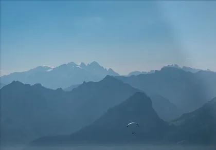 Paragliding Over Schafberg Mountain, a photograph from Austria