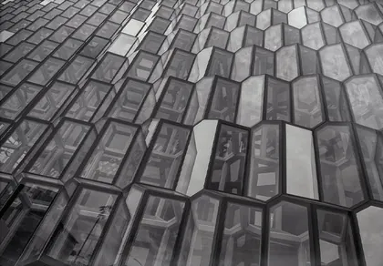Reykjavik Opera House, a black and white photograph by Nick from Iceland