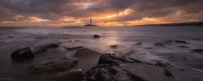 St Mary's Lighthouse Sunburst, a photograph from the North East